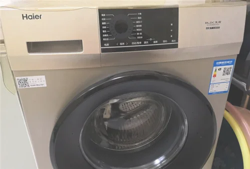 海尔滚筒洗衣机过滤器怎么打开