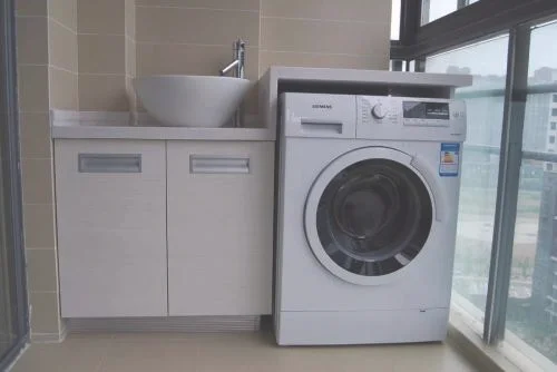 全自动洗衣机排水管怎么放